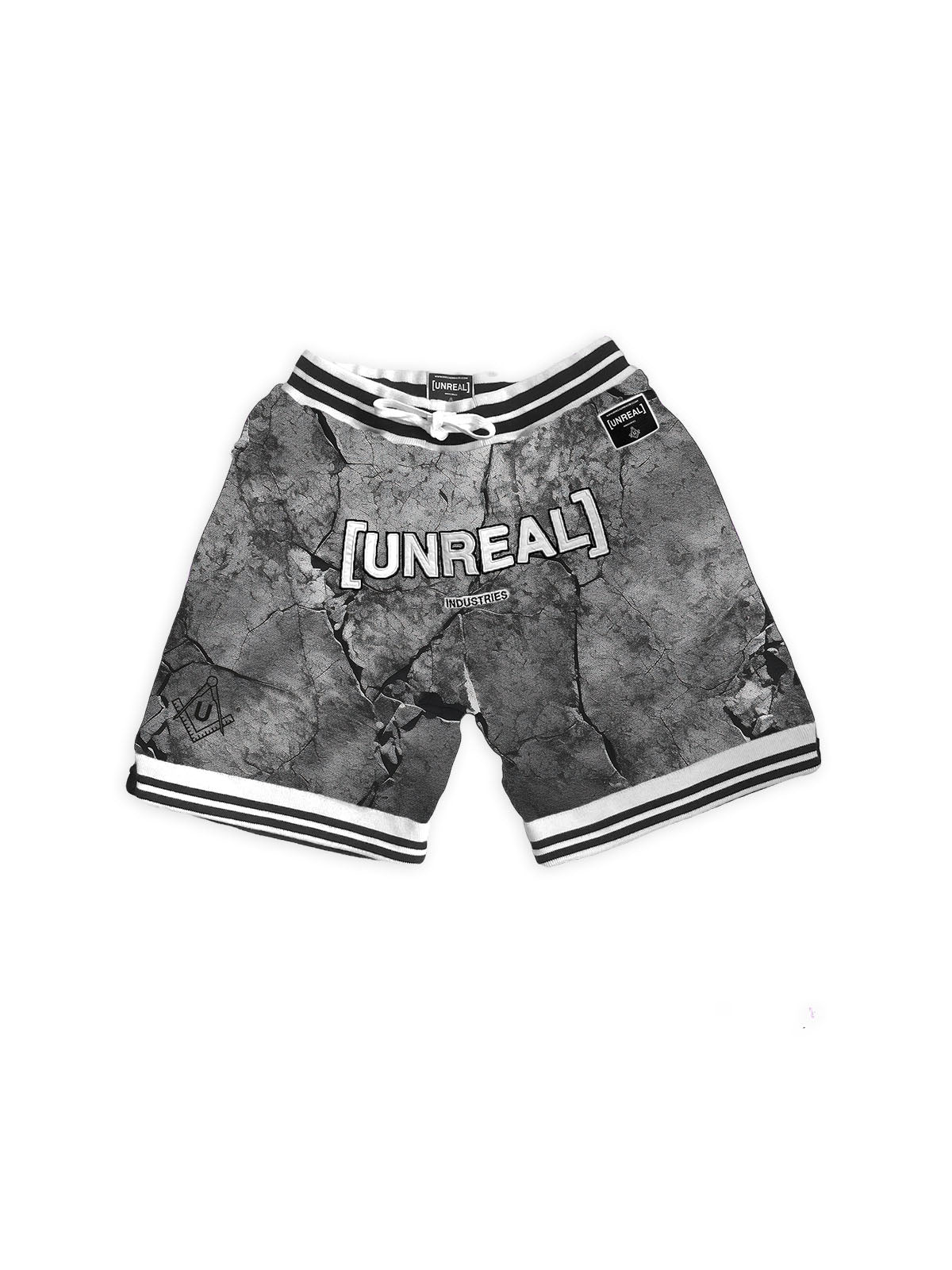 UNREAL Team Shorts in rock grey colorway for sport or streetwear. Embroidered logo on front, mesh style material. Unrealindustry streetwear